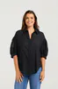 Model wearing Black Ella Shirt By NMBR Rose Available at Beetees Nelson